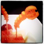 This was a garnish on the fruit. A carrot lobstah!  SUPER CUTE!  