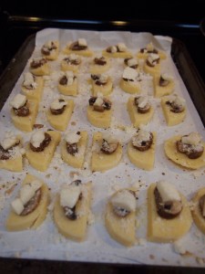 On baking sheet: Polenta with Baby Bella Mushrooms and the fresh mozzarella on top