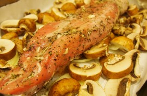 Lay the roast on top of the mushrooms and onions
