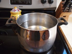 Start with cold water. Do NOT turn heat on until all items are in the stock pot.