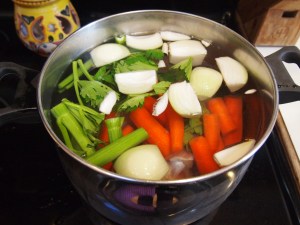 All items in the cold water.  Now you can turn on the heat to medium high.