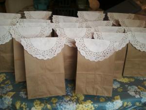 The Goody Bags!  How cute!  They are paper lunch bags filled with Hello Kitty themed toys and then sealed with a white doilie on top.  loved these!