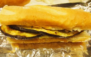 The panini assembled being wrapped