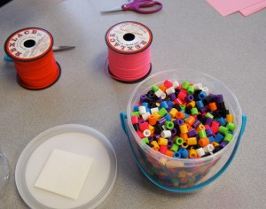 My table.  The beads and gimp!
