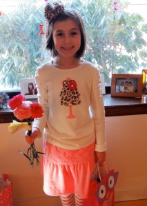 She got three valentine flowers!