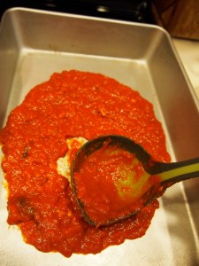 Add sauce to the bottom of the pan