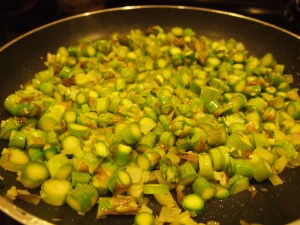 Add asparagus and toss in oil