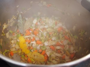 Remove the lamb and then add in the vegetables, herbs and zest