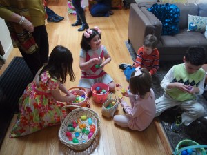 The kids gathered going through their eggs.