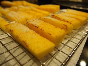 Once browned on all FOUR sides, sprinkle with cheese and let cool on a rack