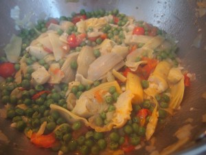 smash the tomatoes with your spoon as it is simmering together.