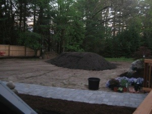 After setting the patio, working on the lawn.