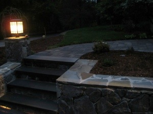 The stone work from the front we had built, the  grass and plantings.  First photo of it complete