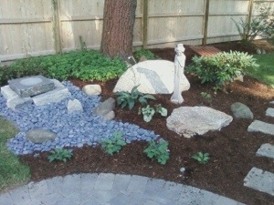 The garden under our tree near the patio.