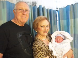 My parents with their newest grandson.  Grandchild #6!!