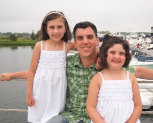 The girls with the big man.  Super sweet pic right?