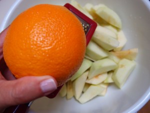 Grate an entire orange for the zest.  