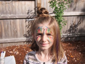 My niece wanted a half up Geisha do. Cute Belle!