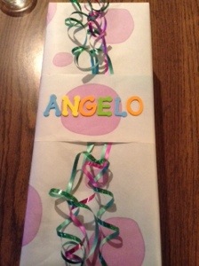 Young boy wrapping paper