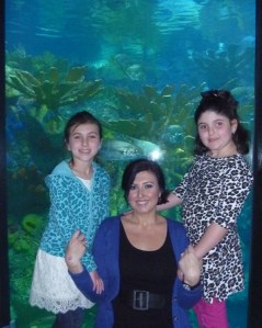 Me with my girls. We took this exact photo when they were four years younger -except my baby girl was in a carriage!  (at 2 and 4)